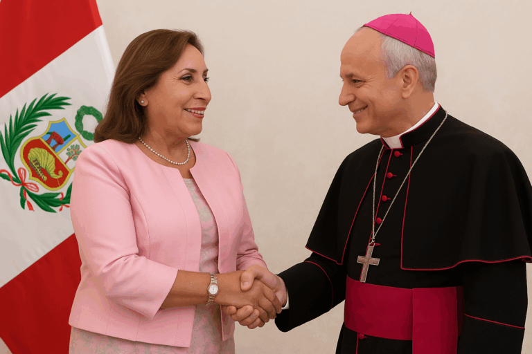 Dina y el papa León XIV dándose la mano.